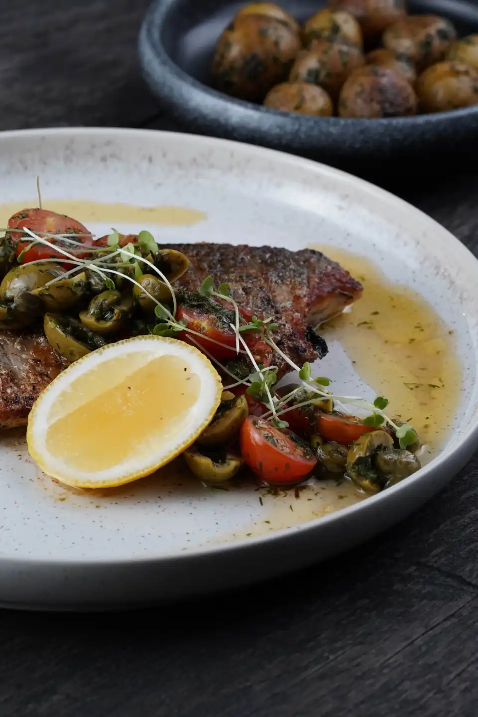 The View restaurant Menu - A cook flambéing a dish prepared in a wok
 - Ribeye Beef (250g), Crispy Potato Gratin, Asparagus Biu Biu Resort Bali
