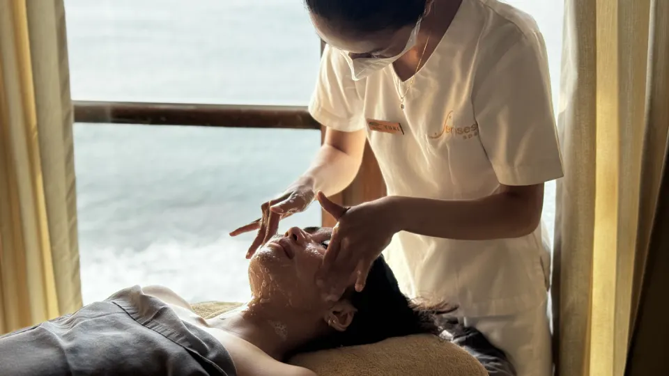 Facial treatment at a Bali spa with therapist and relaxing atmosphere